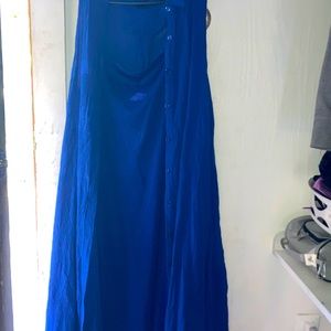 It is a blue cover up dress